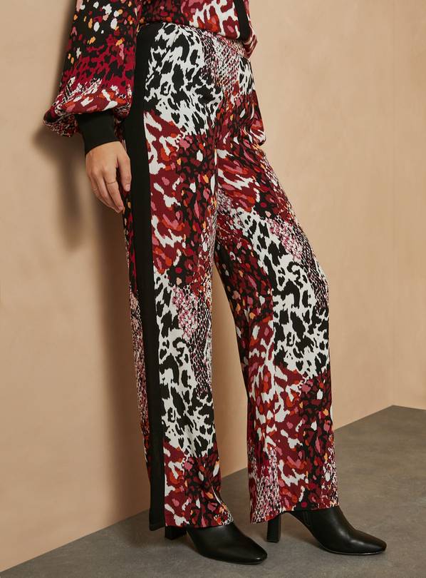 Red animal 2024 print trousers